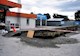 After the 2010 earthquake near Christchurch, New Zealand, liquefaction occurred throughout the city, including at this gas station. (Image courtesy of Martin Luff) 