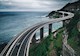 winding bridge along shoreline